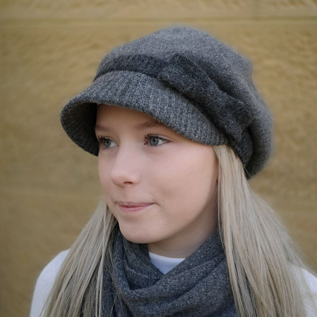 Ladies merino 100% Australian Wool Cap Beret with a peak in grey colour designed in Tasmania by Grizzly Hatters