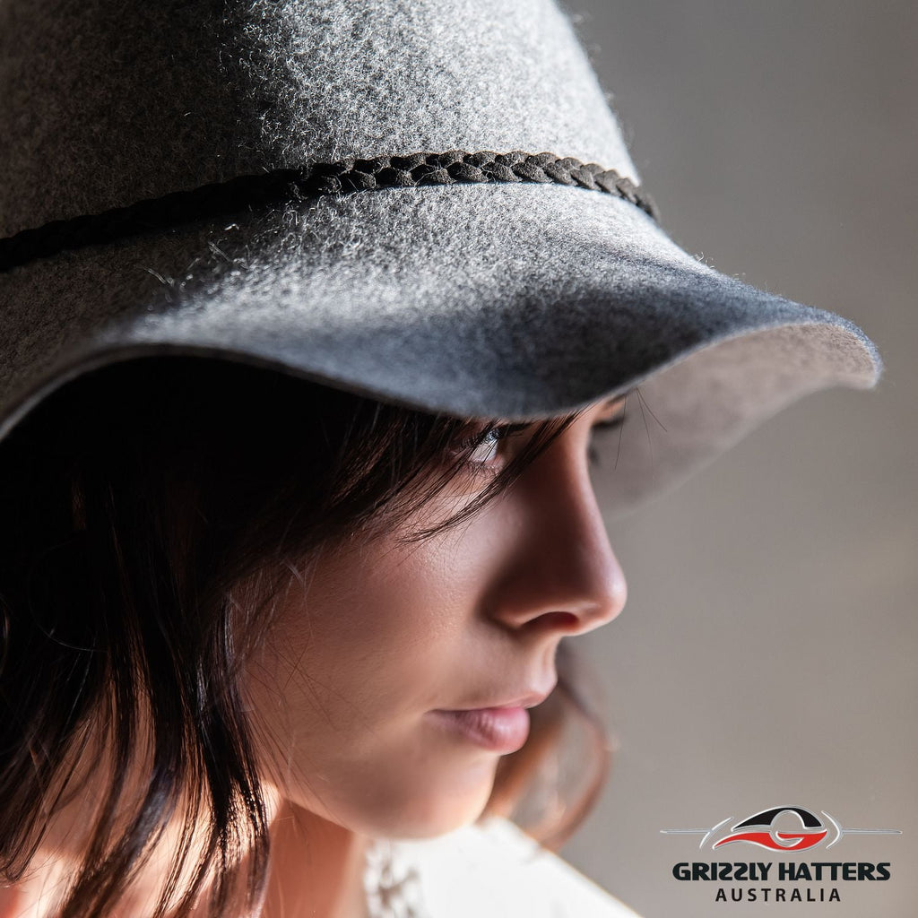 Ladies elegant felt hat with medium size brim in light grey colour hand made in Tasmania Australia by Grizzly Hatters
